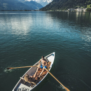 couple taking a boat tour in lake zell