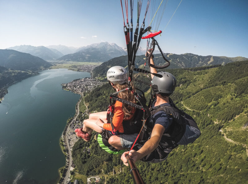 view over the lake while tandem paragliding with falken air zell am see